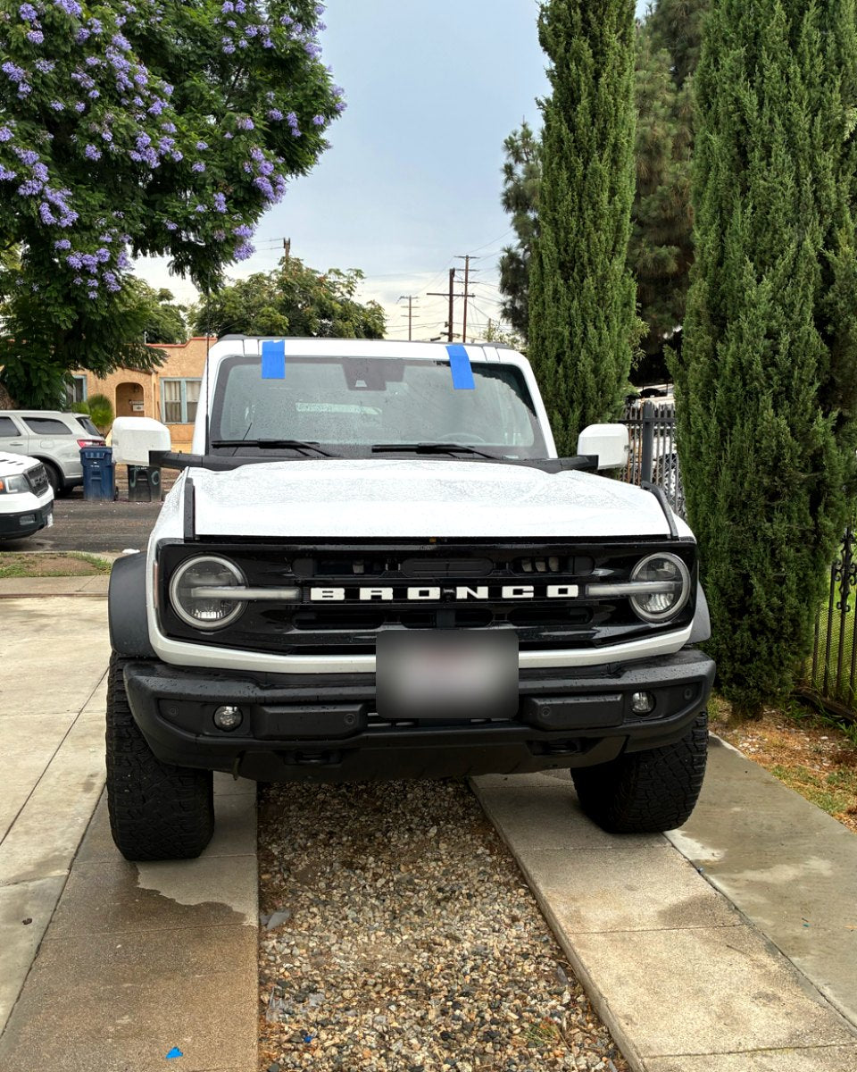New windshield on a Ford Bronco installed in the customer's driveway in Los Angeles